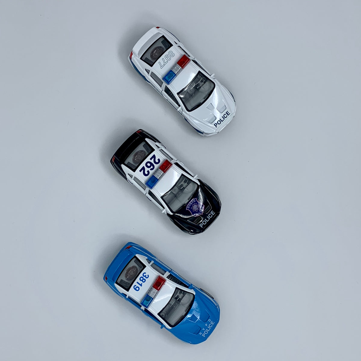 01676 POLICE CAR WITH SOUNDS AND LIGHTS – McBeth Corporation